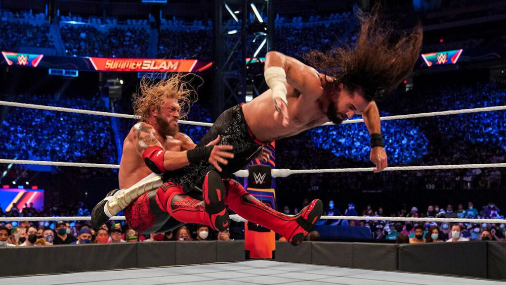 Top 10 WWE Feuds That Played Out on Social Media 8 Edge vs. Seth Rollins