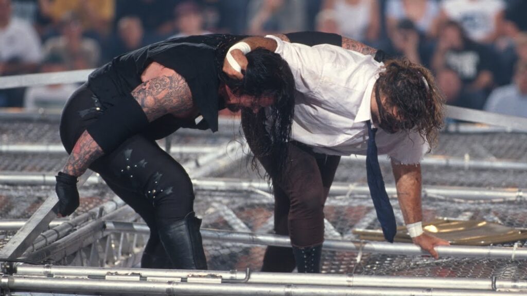 15 Insane Moments WWE Fans Still Can’t Get Over 2 Mankind's Hell in a Cell Plunge