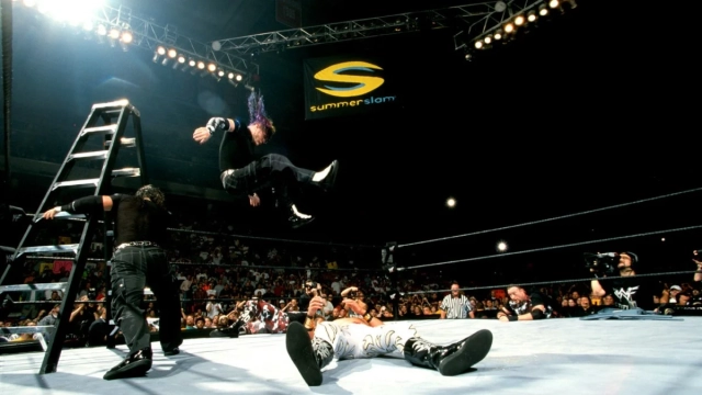 10 Epic Matches WWE Fans Say You Must Watch 6 TLC II - WrestleMania X-Seven (2001)